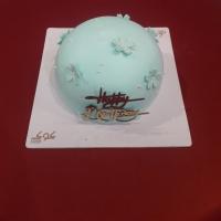 کیک گرد آبی گل دار