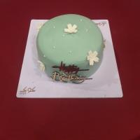 کیک گرد سبز گل دار 