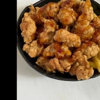 سیب زمینی سرخ شده با مرغ پفکی