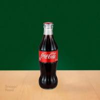 نوشابه شیشه ای کوکا کولا