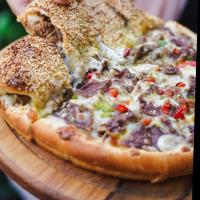 پیتزا رست بیف و استیک OM