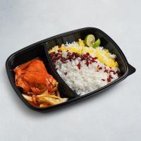 نیم پرس زرشک پلو با ران مرغ سس پز