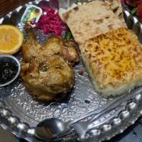 چلو اکبر جوجه با سس انار 