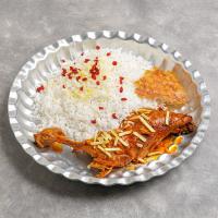 زرشک پلو با ران مرغ سس پز