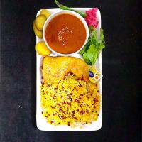 زرشک پلو با ران مرغ سرخ شده