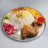 زرشک پلو با ران مرغ سرخ شده با برنج ایرانی