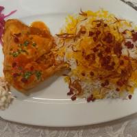 زرشک پلو با ران مرغ سس پز