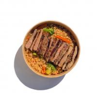 بشقاب استیک گوشت و برنج قهوه ای