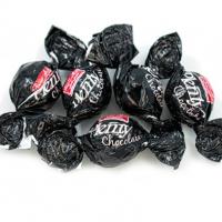 شکلات تلخ مغزدار دو سر پیچ پلنتی با تکه های فندق شیرین عسل