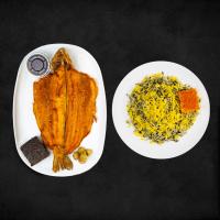 سبزی پلو با ماهی قزل آلا سرخ شده