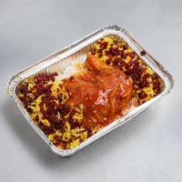 زرشک پلو با ران مرغ سرخ شده سس پز