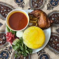 زرشک پلو با ران مرغ سرخ شده با برنج خارجی