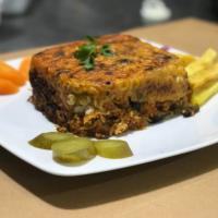 لوبیا پلو با گوشت ته دیگ دار