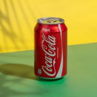 نوشابه قوطی کوکا کولا