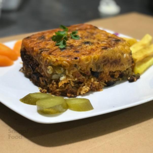 لوبیا پلو با گوشت ته دیگ دار